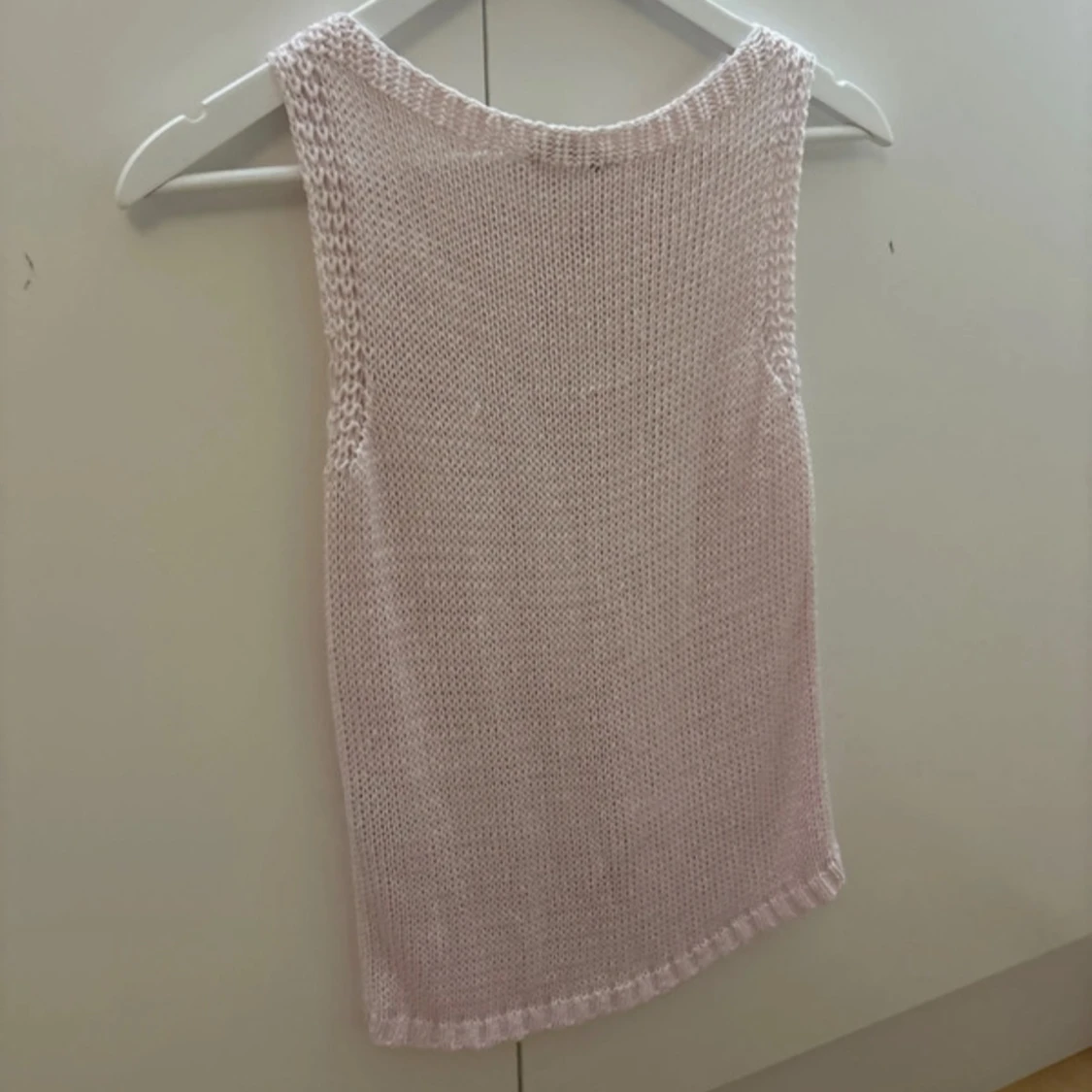 Rosa stickad ärmlös topp - 90