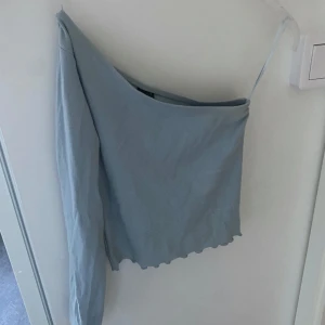 Blå topp - Skirv vid intresse 