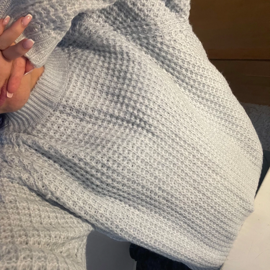 Ljusblå stickad tröja