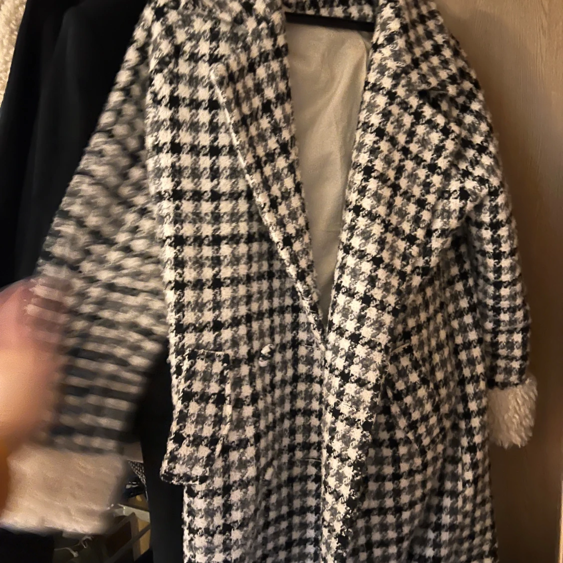 Rutig kappa med teddyfoder