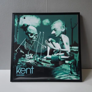 Kent - Albumaffisch, 31.5x31.5  - Kent - Du & jag döden albumaffisch, 31.5x31.5cm  Helt ny - Passar bra i IKEAs tavelram Lomviken!  Skickas i papprulle - Ramen ingår inte!