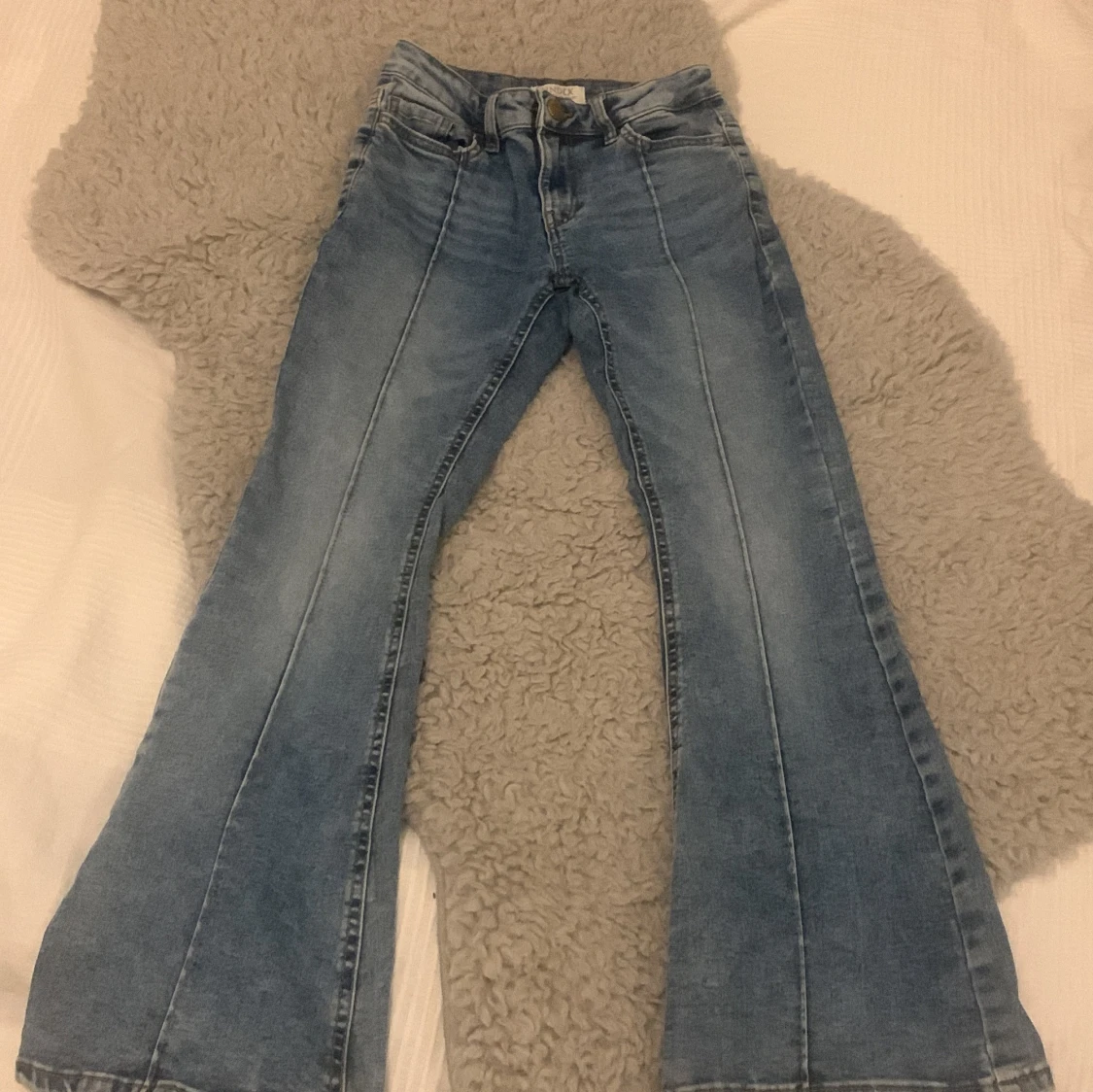 Blå jeansbyxor från Lindex storlek 140