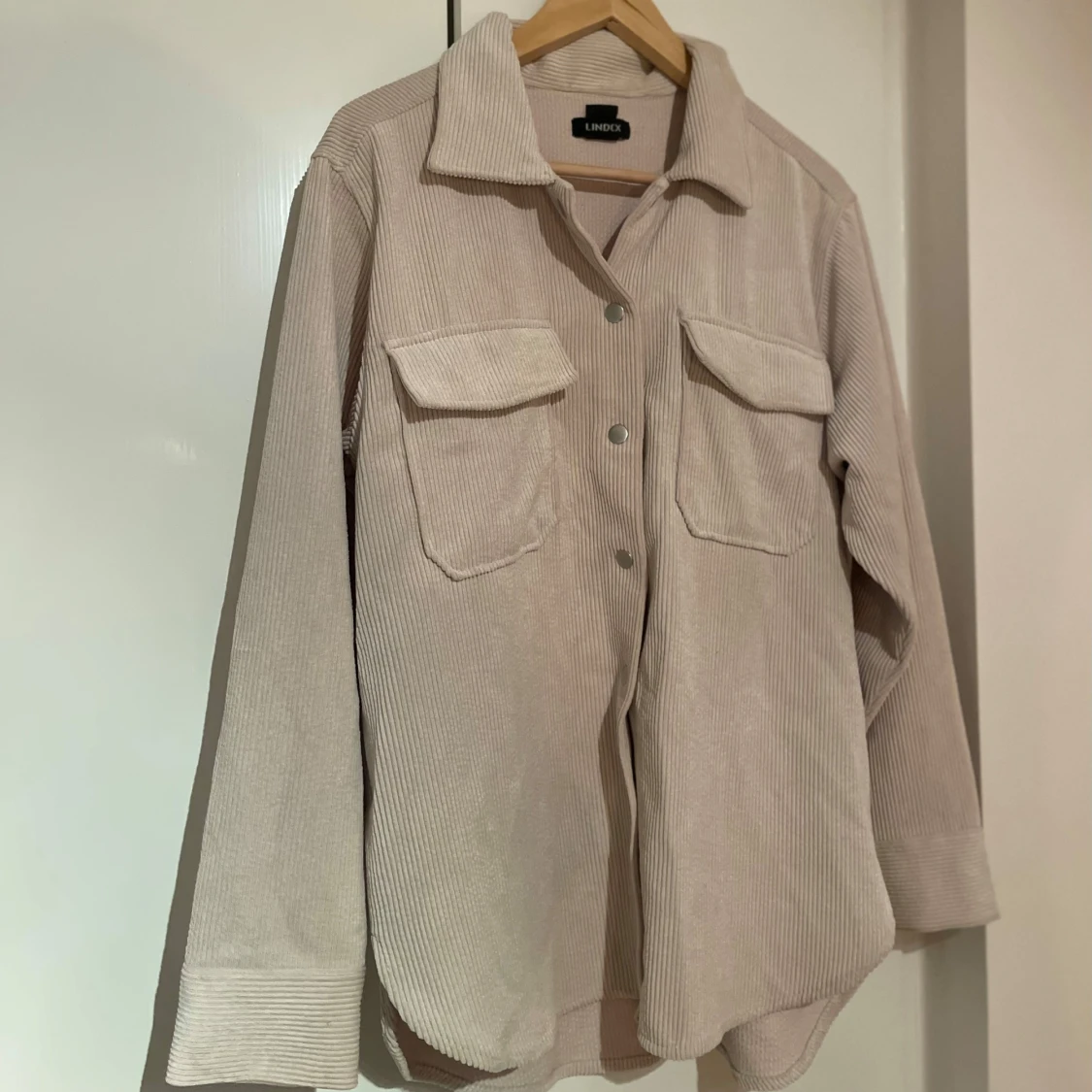 Beige Manchester Jacka