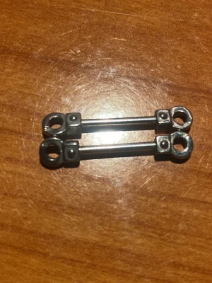Nipplepiercing - Nipple piercing i titan. Längd är 14mm och tjocklek är 1,6mm. Det är handbojor som kulor.