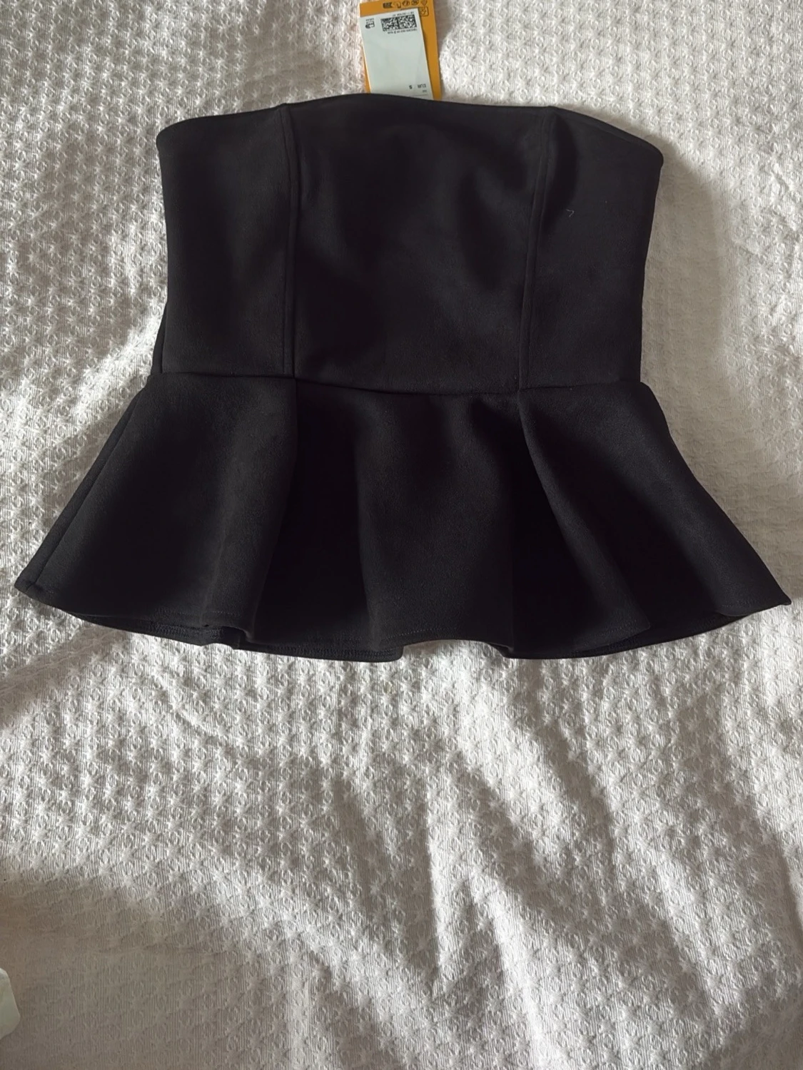 Svart peplum tubtopp