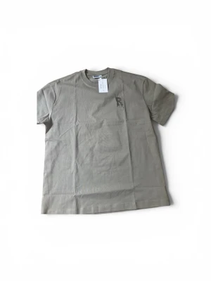 Green T-shirt Risky university - Helt ny, s men stor i storlek 