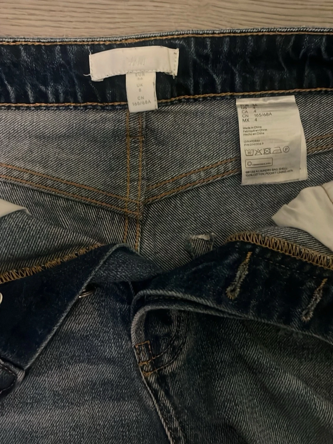 Högmidjade blå jeansshorts - 2