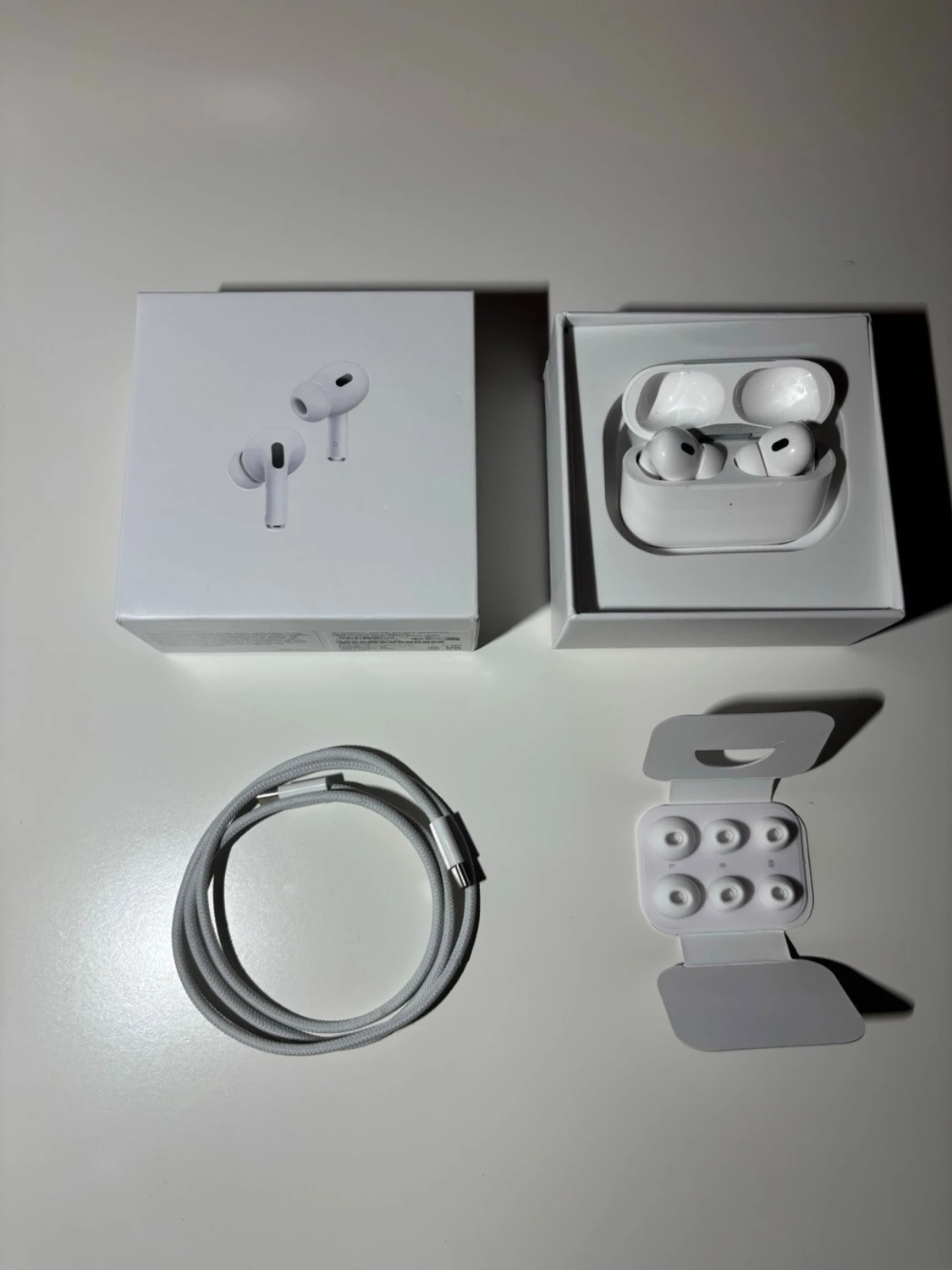 Apple AirPods Pro med laddningsetui