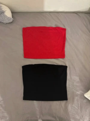 toppar - S - säljer dessa två toppar i storlek S i färgen röd och svart! 
