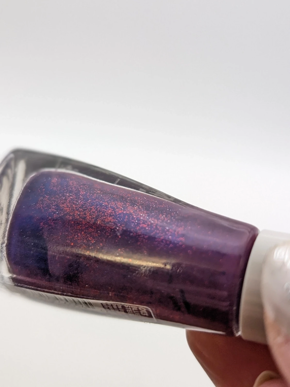 Lila glitter nagellack Sally Hansen nästan full