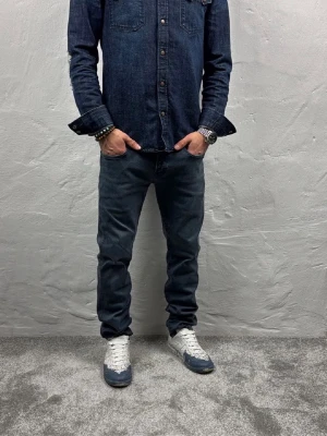 Replay jeans  -  Ett par riktigt snygga jeans från Replay i storlek W32 L32 i modellen Anbbas Hyperflex 
