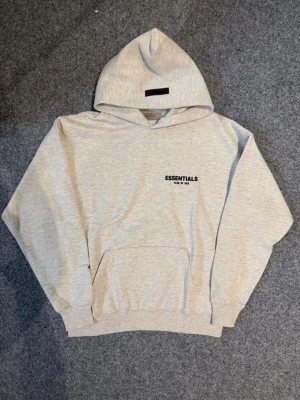 Essentials light oatmeal gray hoodie - Size M, true to size. No stains or damage, very new!