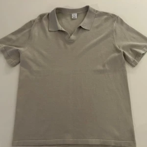 Beige piké - Beige piké storlek 158/164.