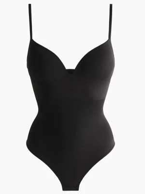 H&M body - H&M kända body. Älskar modelen och sitter som en smäck men för stor så den har inte kommet till användning🤍