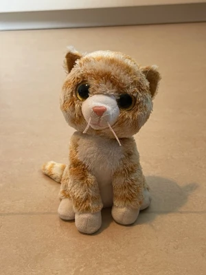 Blonde katt - Liten katt. Höjd ca 15 cm