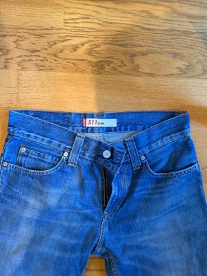 Levi's 511slim blå jeans - W31 L34. Bra skick! 