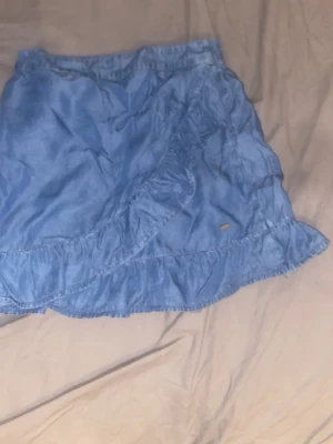 En volang tjol - En fin blå volang tjol