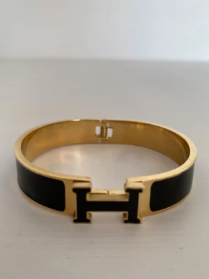 Svart och guld  armband - Armband 