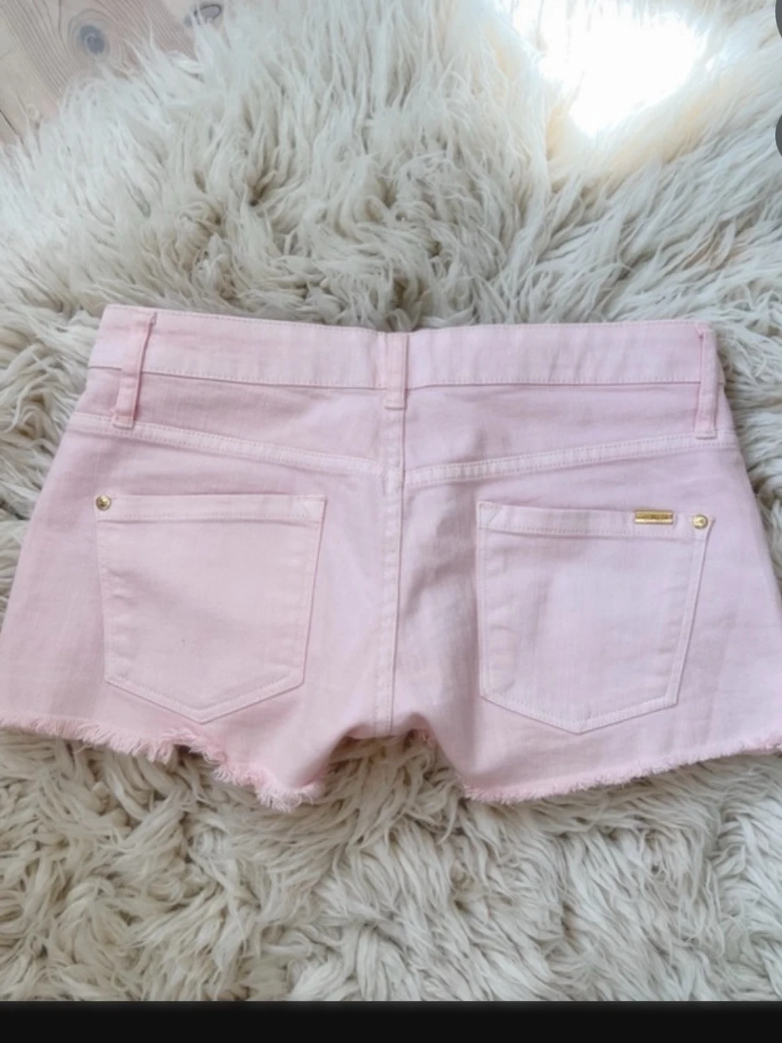 Ljusrosa lowrise lowwaist lågmidjade jeanshorts