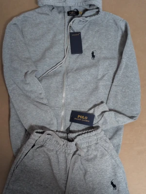 Ralph Lauren set - Got a Ralph Lauren matching set for sale. Grey zip up hoodie and shorts. Both size M. Clean and in good shape. Super comfortable and looks great together or separate. Looking for a quick sale, so hit me up if you want a better price.