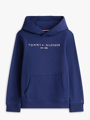Marinblå hoodie från Tommy Hilfiger - OBS!! Hoodien är i storlek 164 som motsvarar  XS eller i åldersgruppen 13-15 år. Marinblå hoodie från Tommy Hilfiger med klassisk logga och texten 'EST. 1985' på bröstet. Hoodien har stor huva, magficka och ribbade muddar vid ärmar och nederkant. Tillverkad i mjukt bomullsmaterial som är skönt att ha på sig.