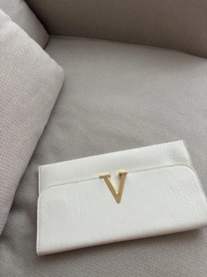 Vit kuvertväska  - Fin vit kuvertväska 
