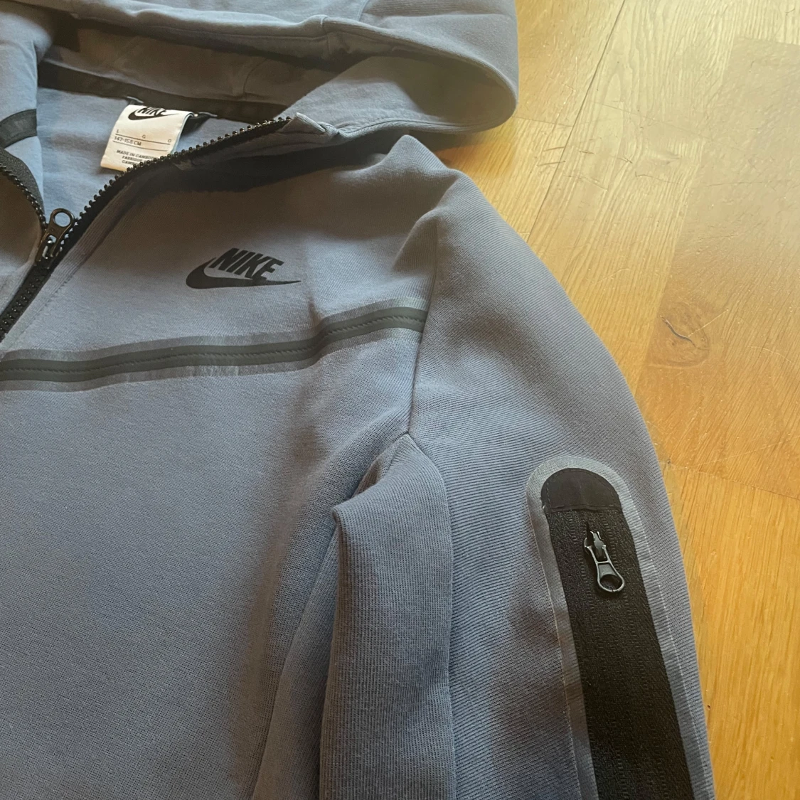 Ljusblå hoodiejacka från Nike - 1