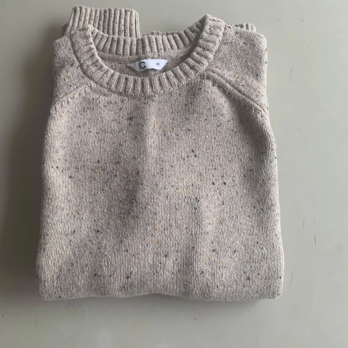 Beige stickad tröja