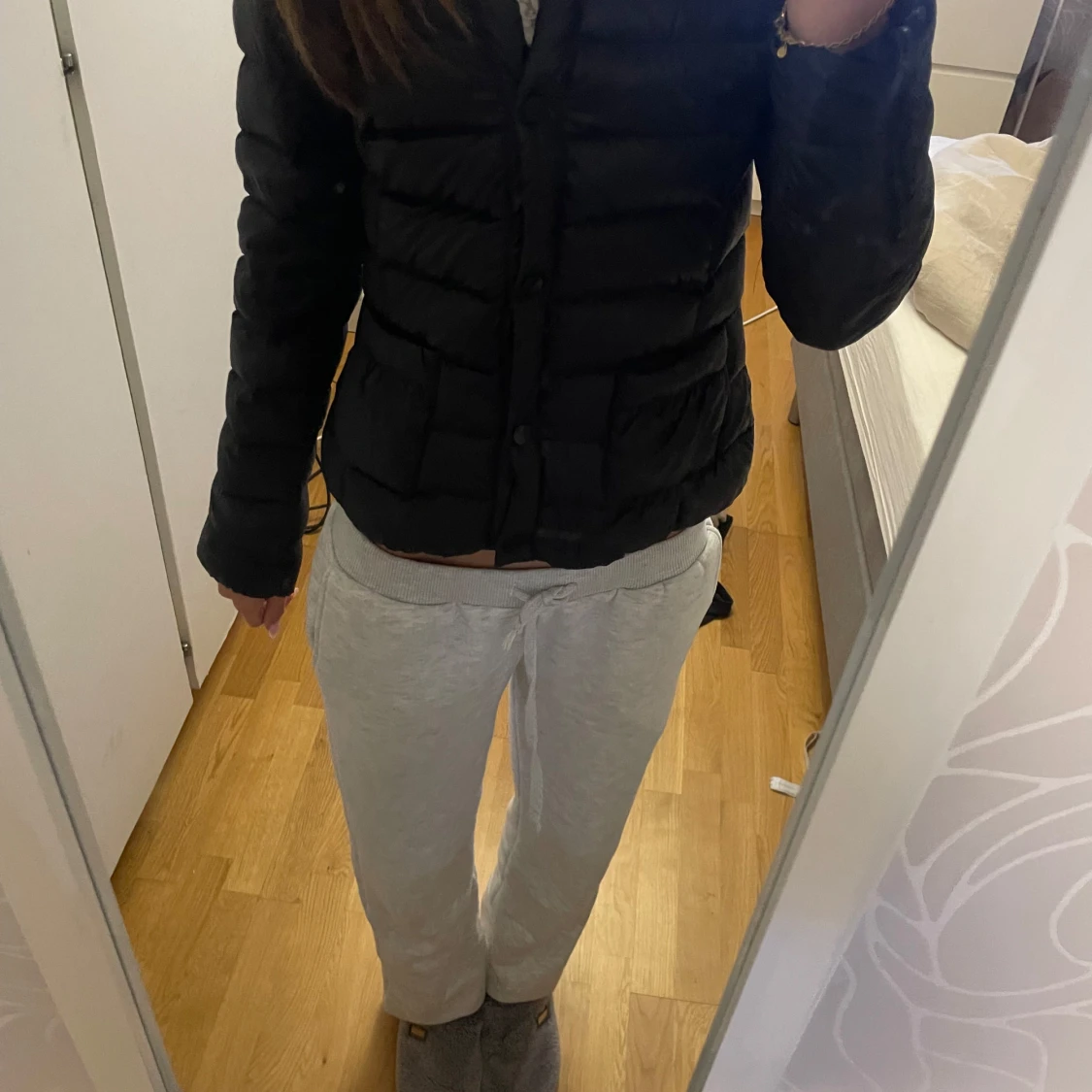 Svart pufferjacka med knappar - 1