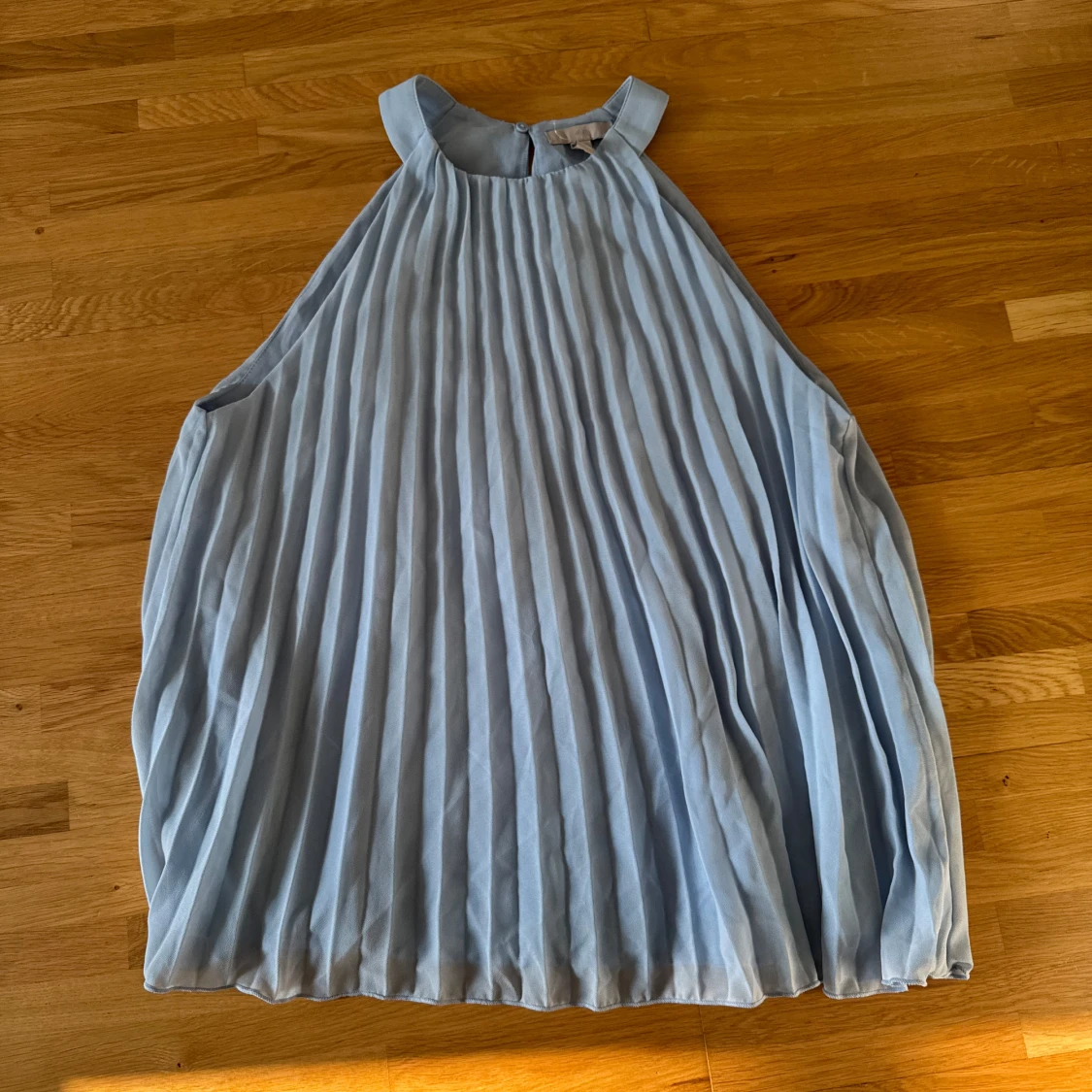 Ljusblå plisserad top H&M - 1