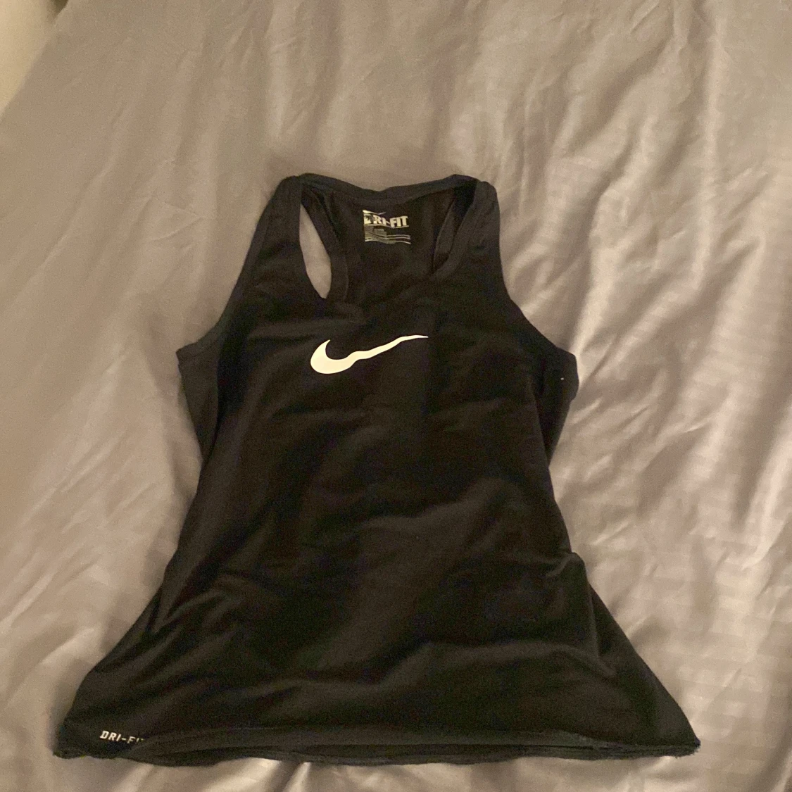 Svart Nike Dri-FIT linnetopp M