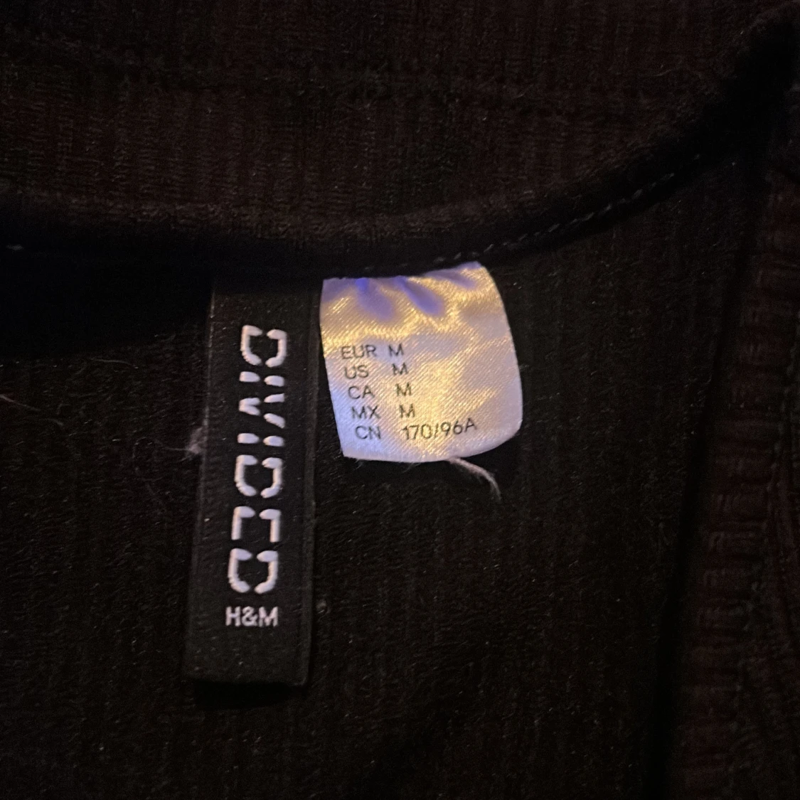 Svart ribbad topp med snörning H&M - 2