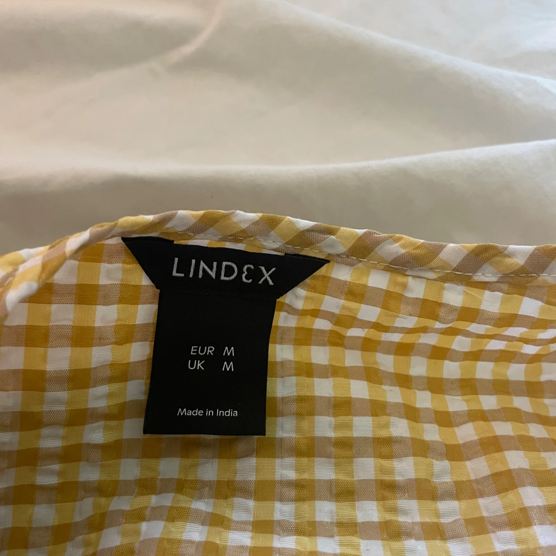 Gul och vit rutig omlottblus Lindex - 1