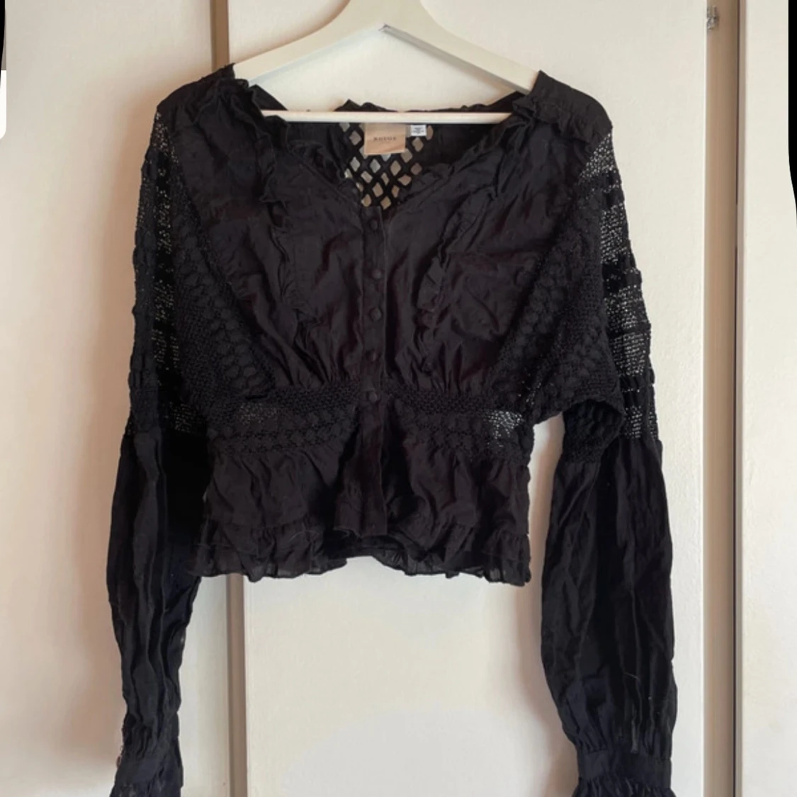 Svart blus med spets 