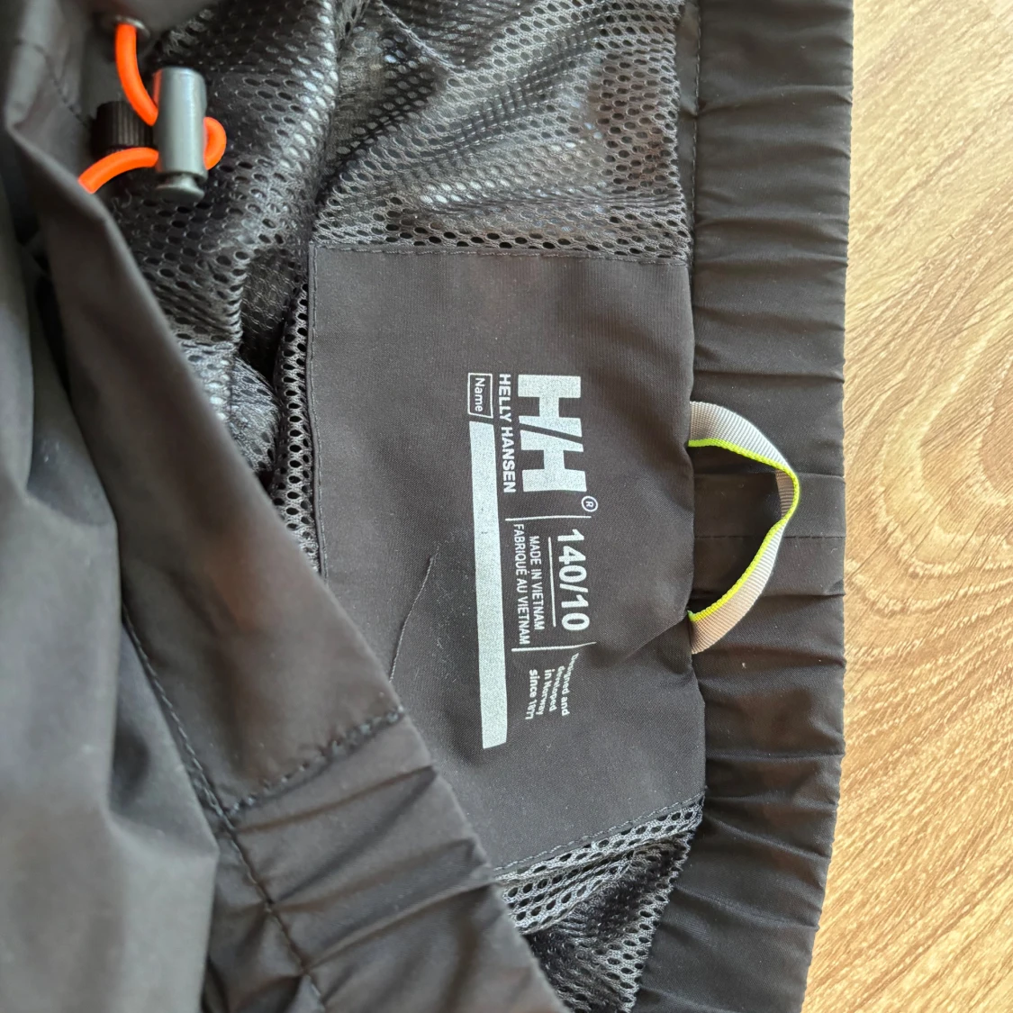 Svarta täckbyxor Helly Hansen 140 - 1