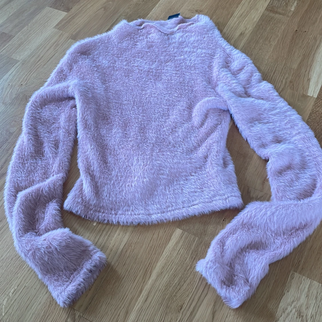Rosa fluffig tröja