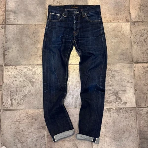 Selvage Nudie - Säljer dessa sjukt feta selvage nudie jeans i modellen grimtim, jeansen är i fint skick med sjukt feta fades, storlek W30/L34, hör av dig vid funderingar!💯