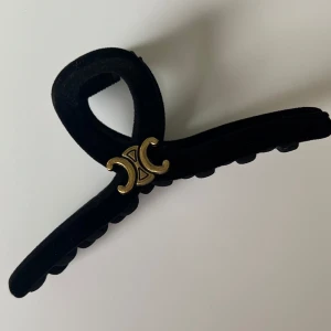 Svart hårklämma  - Oanvänd svart elegant hårklämma 