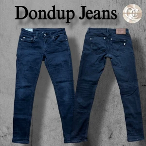 Svarta dondup jeans  - Snygga svarta jeansbyxor med en skönt jeans material. De har en smal passform och är perfekta för en stilren look. 