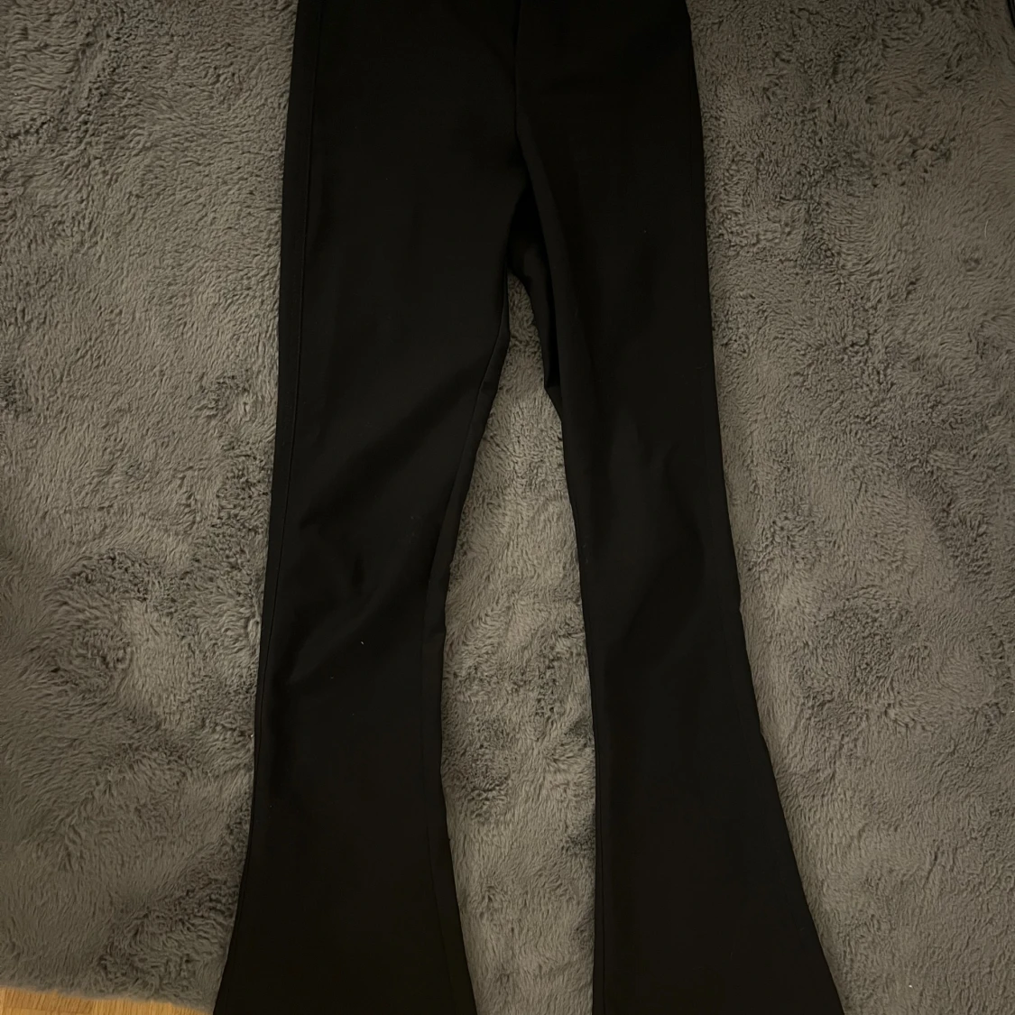 Svarta bootcut kostym byxor med ficka