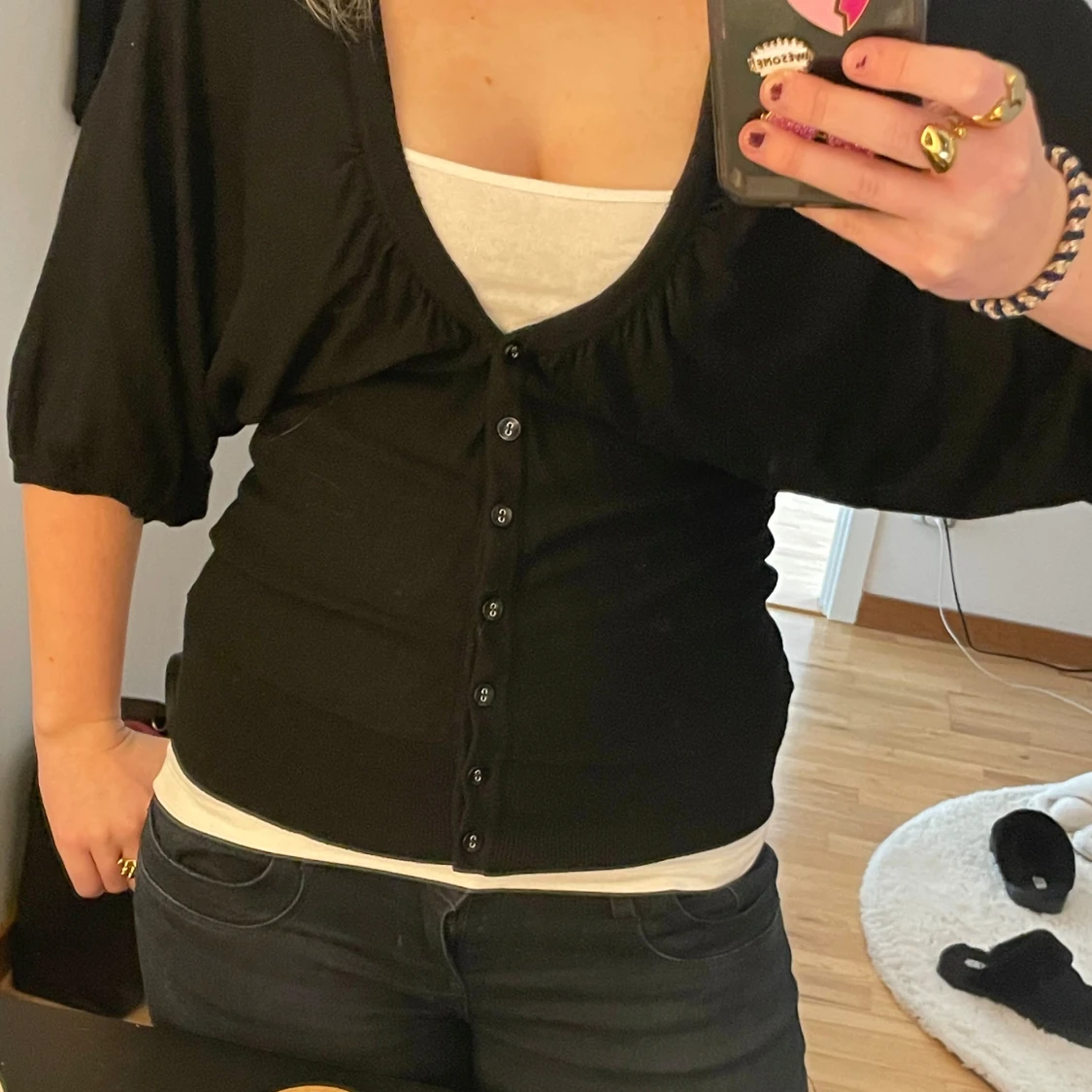 Svart kofta med knappar - 1