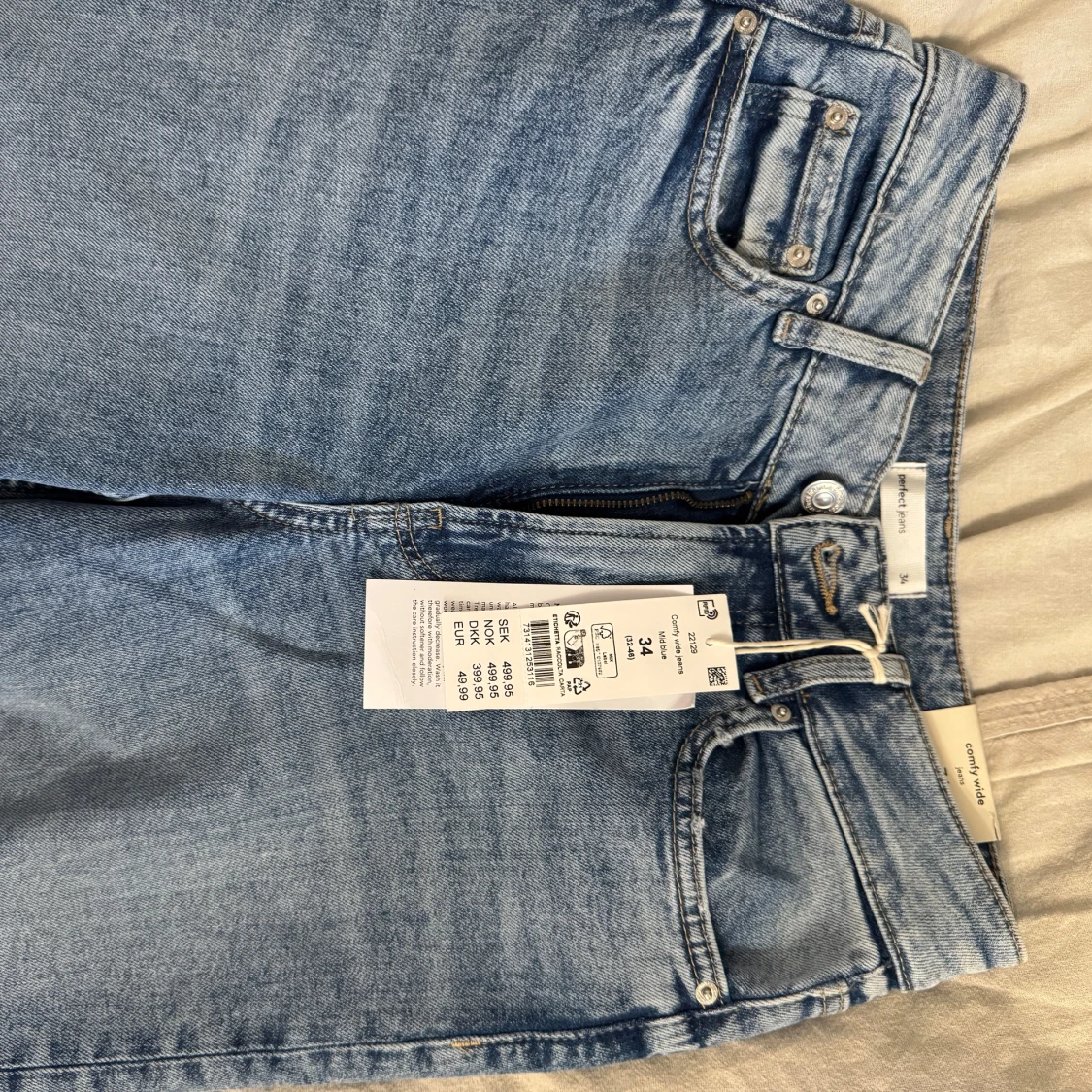 Blå wide jeans från Gina  - 1