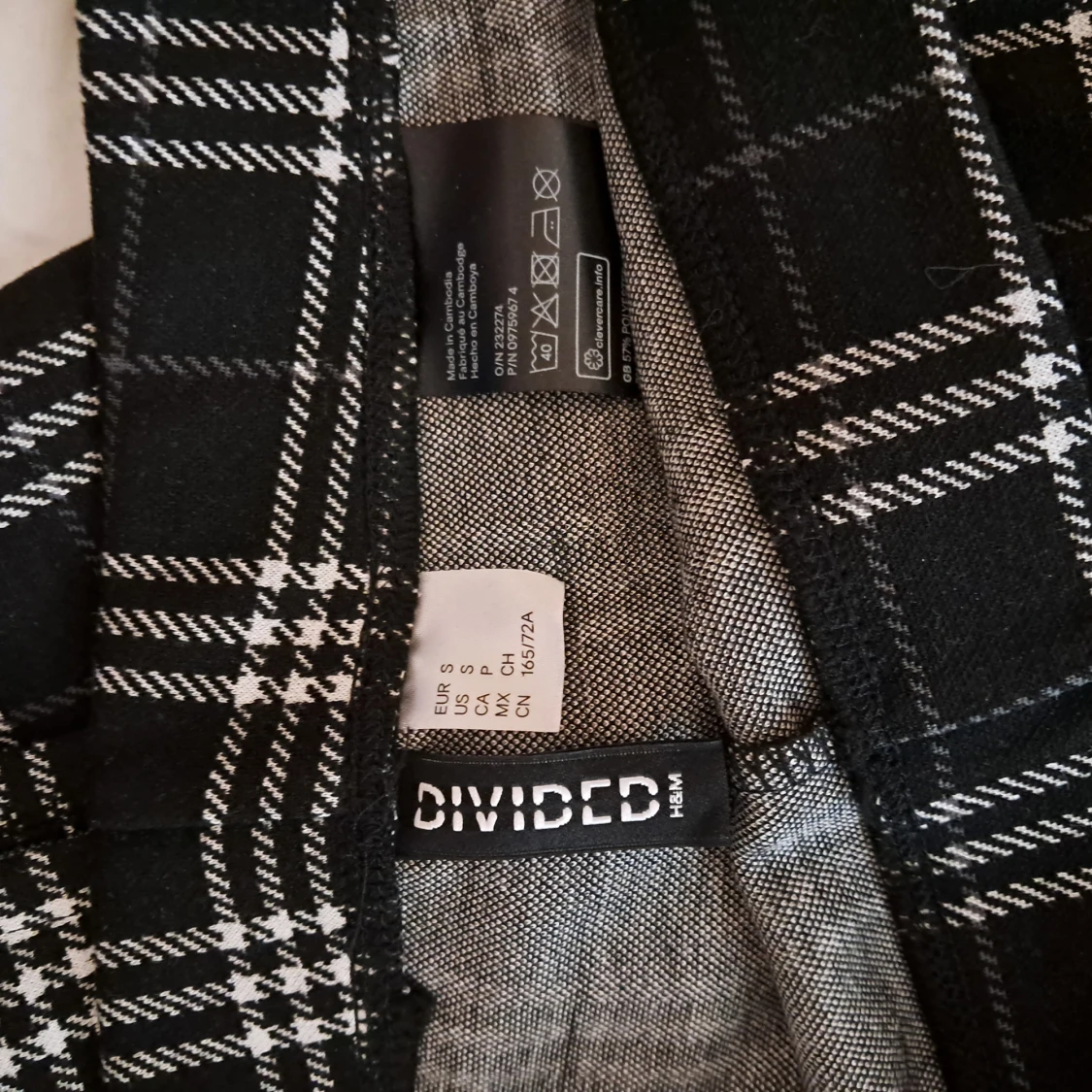 Svarta rutiga bootcut-byxor H&M - 2