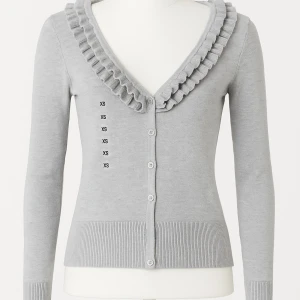 Grå kofta med volang  - Supersöt ljusgrå kofta från H&M i stl Xs. Första bilden är ifrån Chat GPT