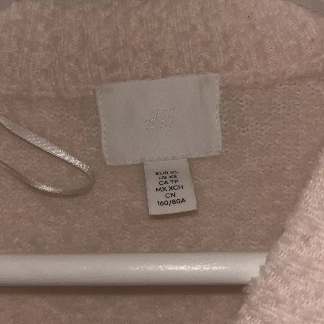 Ljusrosa  stickad tröja från H&M XS - 1