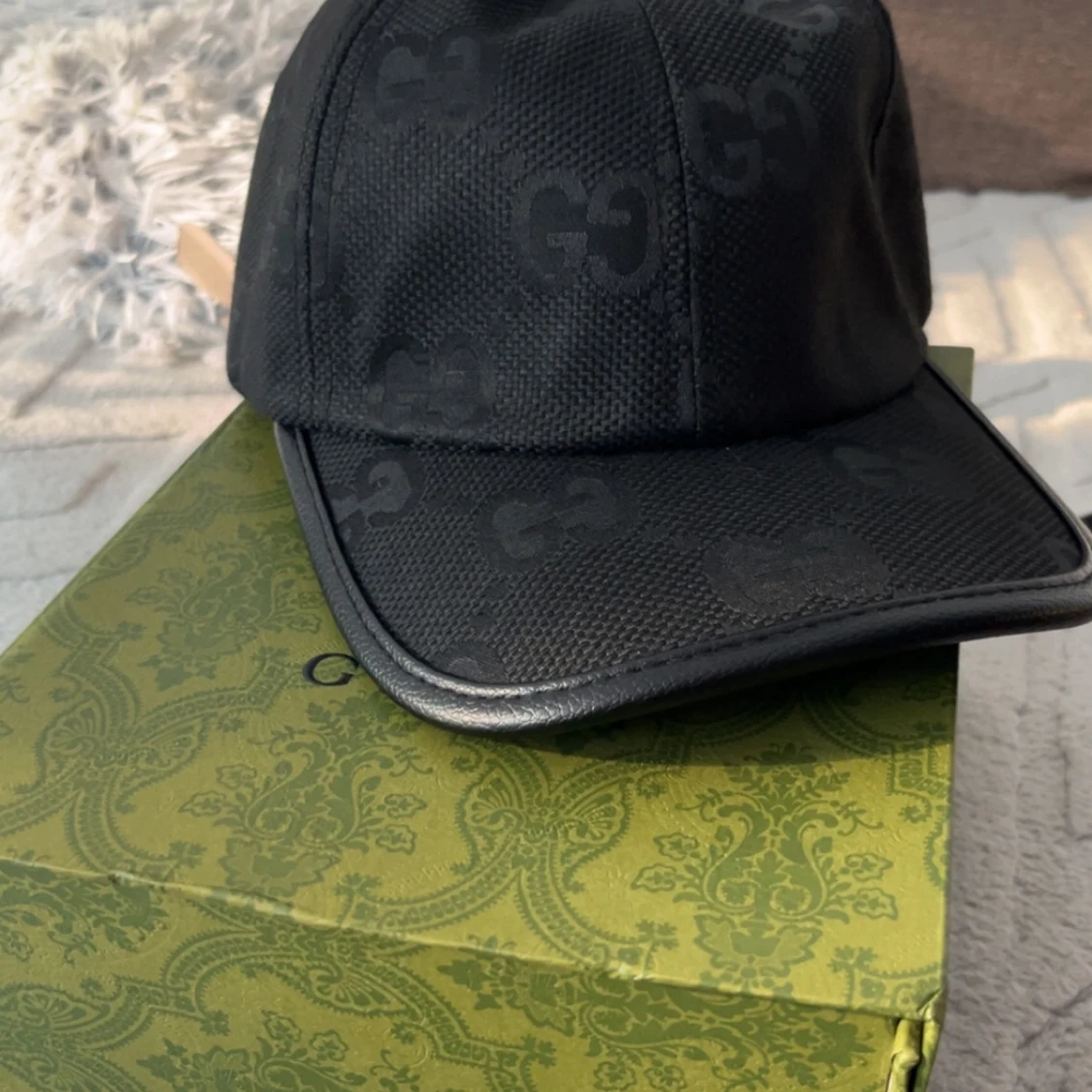 Svart keps från Gucci med GG-mönster - 2