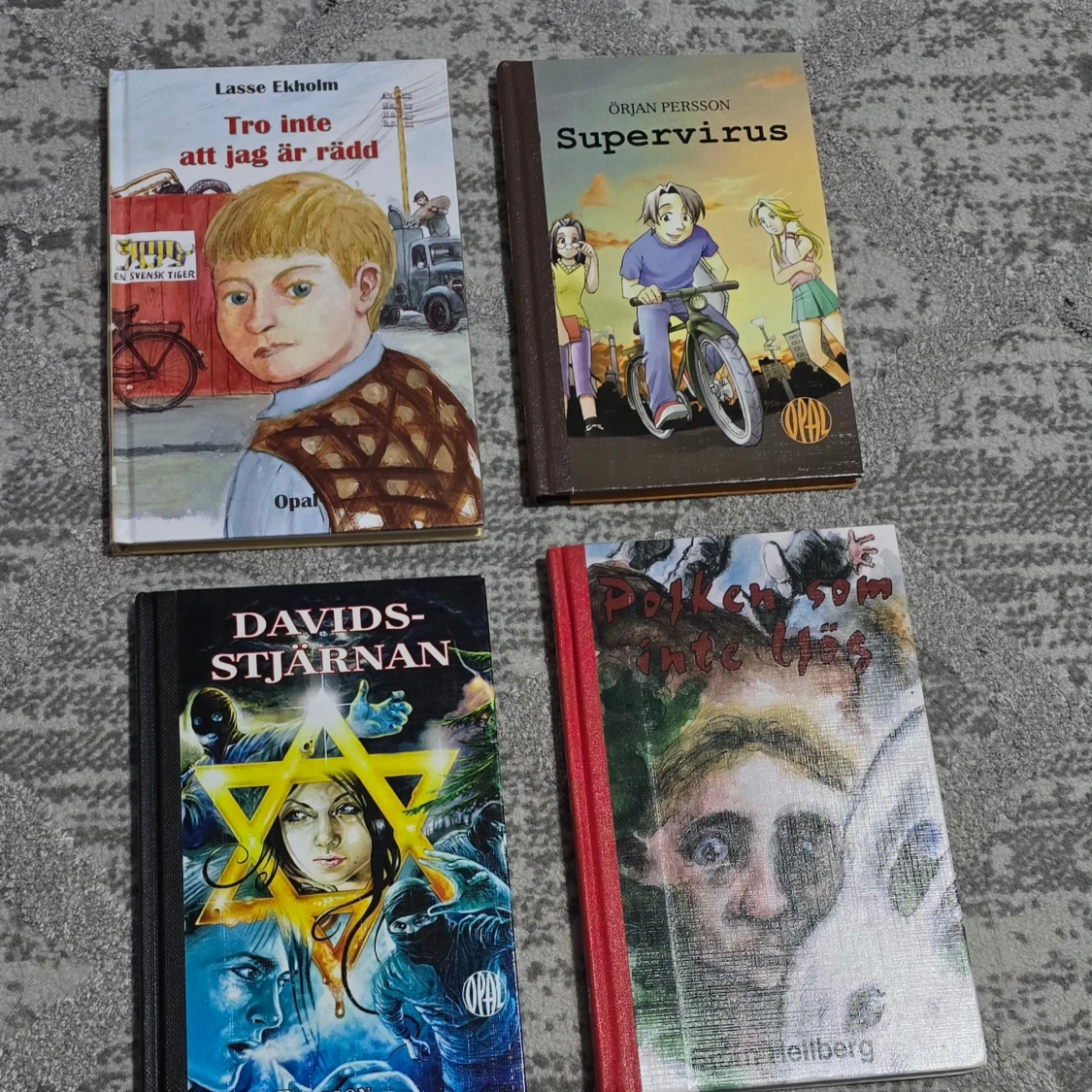 Fyra böcker från Opal