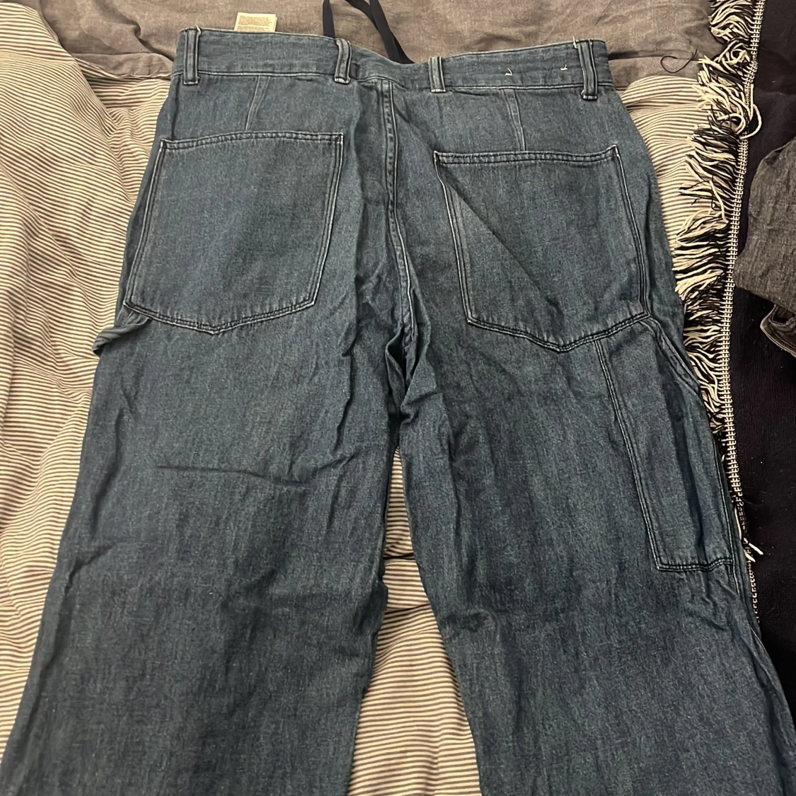 Blå carpenterbyxor från Uniqlo - 1