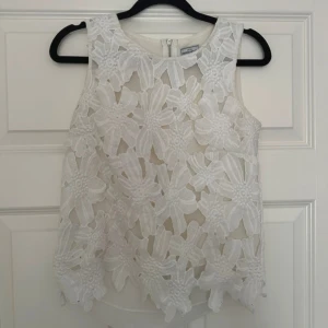 Blommig topo - Super söt topp, i fint skick! 