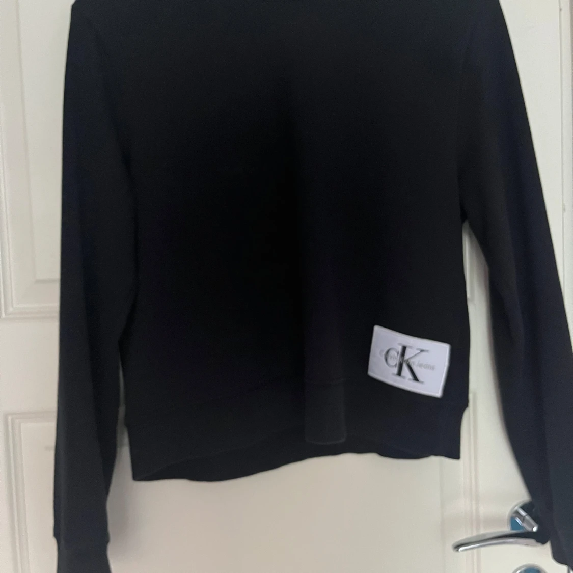 Svart sweatshirt från Calvin Klein Jeans